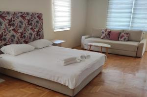 Postel nebo postele na pokoji v ubytování Hotel Drina Premium + 37 fotografií