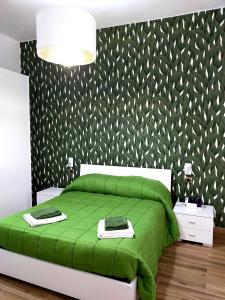 A bed or beds in a room at I MORI G&G