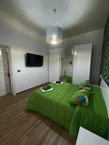 A bed or beds in a room at I MORI G&G