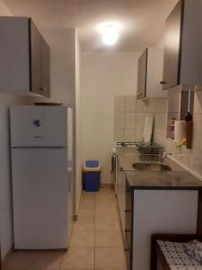 A kitchen or kitchenette at Seaside secluded apartments Cove Torac, Hvar - 4044