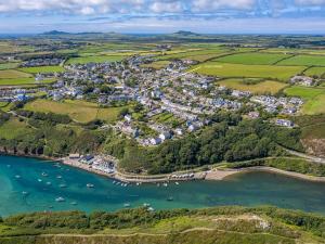 an aerial view of a small town next to a body of water at Alma Cottage in Solva