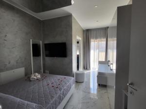 Postel nebo postele na pokoji v ubytování B&B Luxury Room & SPA
