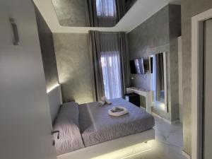 Postel nebo postele na pokoji v ubytování B&B Luxury Room & SPA