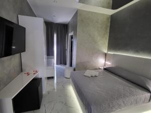 Postel nebo postele na pokoji v ubytování B&B Luxury Room & SPA