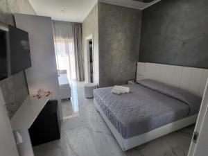 Postel nebo postele na pokoji v ubytování B&B Luxury Room & SPA