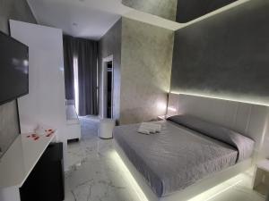 Postel nebo postele na pokoji v ubytování B&B Luxury Room & SPA