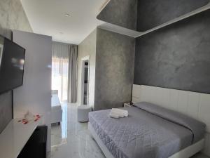 Postel nebo postele na pokoji v ubytování B&B Luxury Room & SPA