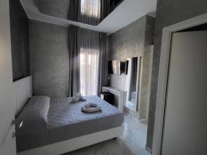 Postel nebo postele na pokoji v ubytování B&B Luxury Room & SPA