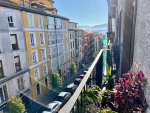 a view of a city street from a balcony at MODERNO Y LUMINOSO EN EL CENTRO DE SANTANDER in Santander