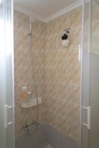 Kúpeľňa v ubytovaní Comfortable and Elegant Seafront Apartment