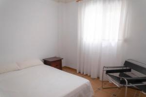 Posteľ alebo postele v izbe v ubytovaní Comfortable and Elegant Seafront Apartment