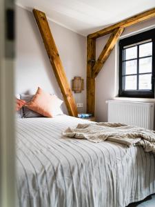 En eller flere senge i et værelse på Horami Villa - HANAMI Apartment