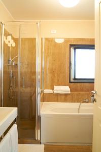 Koupelna v ubytování Aparthotel La Pineta