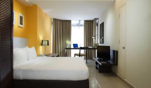 TV a/nebo společenská místnost v ubytování Fahrenheit Suites Bukit Bintang, Kuala Lumpur