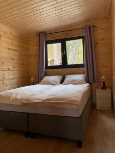 Postel nebo postele na pokoji v ubytování Toscana Camp