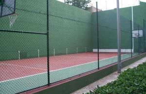 Tenis alebo squash v ubytovaní NUEVO, primera linea de playa, con piscina y vistas al mar alebo jeho okolí