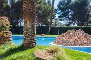 Bazén v ubytovaní NUEVO, primera linea de playa, con piscina y vistas al mar alebo v jeho blízkosti