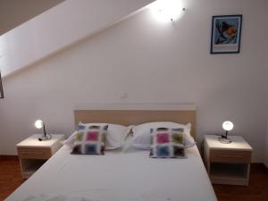 Posteľ alebo postele v izbe v ubytovaní Apartments city center M&M + 29 fotografií