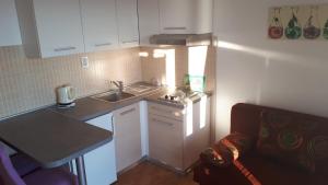 Kuchyňa alebo kuchynka v ubytovaní Apartments city center M&M