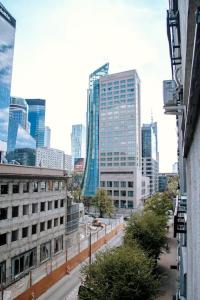 a view of a city with tall buildings at Przytulne mieszkanie w centrum in Warsaw