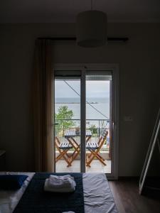 Postel nebo postele na pokoji v ubytování HARBOUR ROOMS