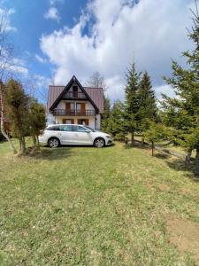 a car parked in front of a house at Montecasa in Travnik +25 photos