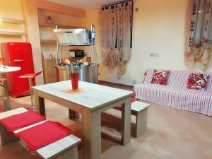 a living room with a table and a couch at Sole&Mare in Monopoli