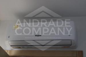 a sign for an american company on a ceiling at Casa da Padaria Antiga 1 in Pinhão +1 photo