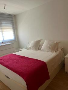Ένα ή περισσότερα κρεβάτια σε δωμάτιο στο Apartamento Costa Cálida II
