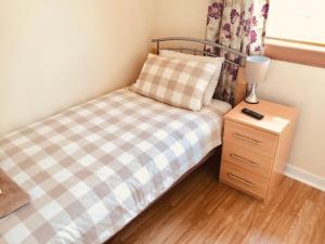 Katil atau katil-katil dalam bilik di Invermac House