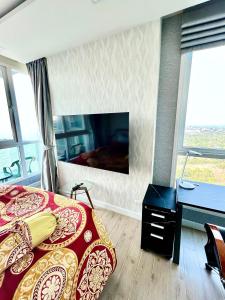 TV a/nebo společenská místnost v ubytování LuxSL LuxuryStyleofLife 4