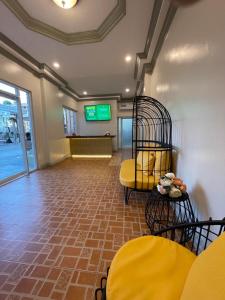 a room with a waiting room with aasteryasteryasteryasteryasteryasteryasteryastery at El Palacio Hotel & Resort in Cavite