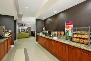 a kitchen with a counter with aasteryasteryasteryasteryasteryasteryasteryasteryastery at Residence Inn Colorado Springs North/Air Force Academy in Colorado Springs