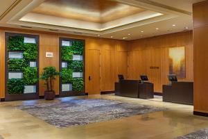 a lobby with a conference room with plants on the walls at The Westin Copley Place, Boston in Boston
