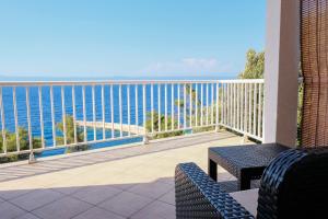a balcony with a view of the ocean at Vila Nada in Prigradica