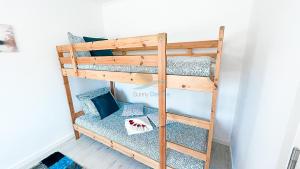 a bunk bed in a room with blue pillows at Casa da Quinta by Sunny Deluxe in Cabeção +51 photos