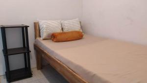 Katil atau katil-katil dalam bilik di Mabs Hostel