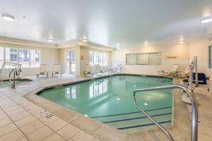 a pool in the middle of a hotel room at TownePlace Suites by Marriott Boise Downtown/University in Boise