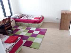 Postel nebo postele na pokoji v ubytování Penzion Apartmány Zlín