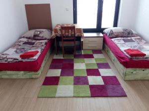 Postel nebo postele na pokoji v ubytování Penzion Apartmány Zlín
