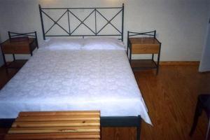 Postel nebo postele na pokoji v ubytování Hotel Patrai