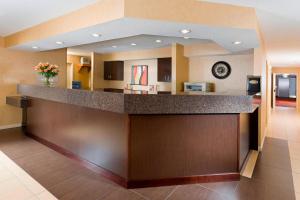 a lobby with a large counter in a hotel room at Residence Inn by Marriott Cedar Rapids in Cedar Rapids