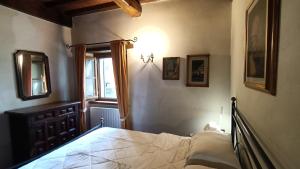 Ένα ή περισσότερα κρεβάτια σε δωμάτιο στο GreenView - CasaVacanza