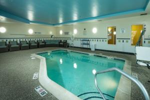 a large swimming pool in a hotel room at Fairfield Inn and Suites by Marriott Augusta in Augusta