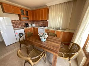 Kuchyň nebo kuchyňský kout v ubytování BG Villas & Aparts
