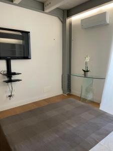 A bed or beds in a room at Casa Giulietta - ombrellone e 2 lettini inclusi