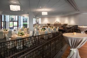 a banquet hall with tables and chairs in a room at Colorado Springs Marriott in Colorado Springs