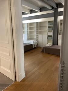 A bed or beds in a room at Casa Giulietta - ombrellone e 2 lettini inclusi