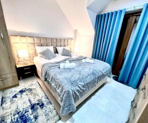 ELFF -Apartamenty i pokoje gościnne客房内的一张或多张床位