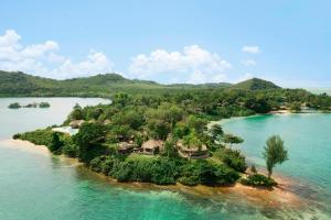 an aerial view of an island in the water at The Naka Island, a Luxury Collection Resort & Spa, Phuket in Ko Naka